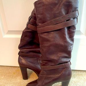 Step out in style with these Boutique 9 knee-high brown strappy boots!